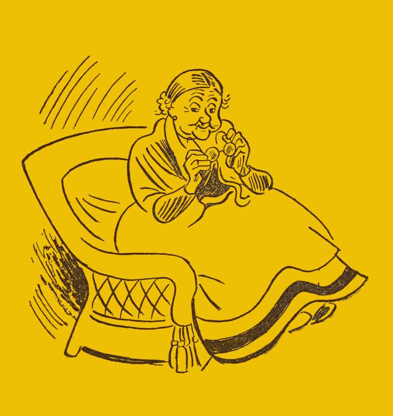 An old woman sitting in a chair.