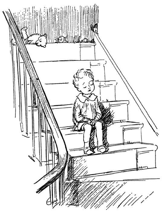 Boy seated on stairs